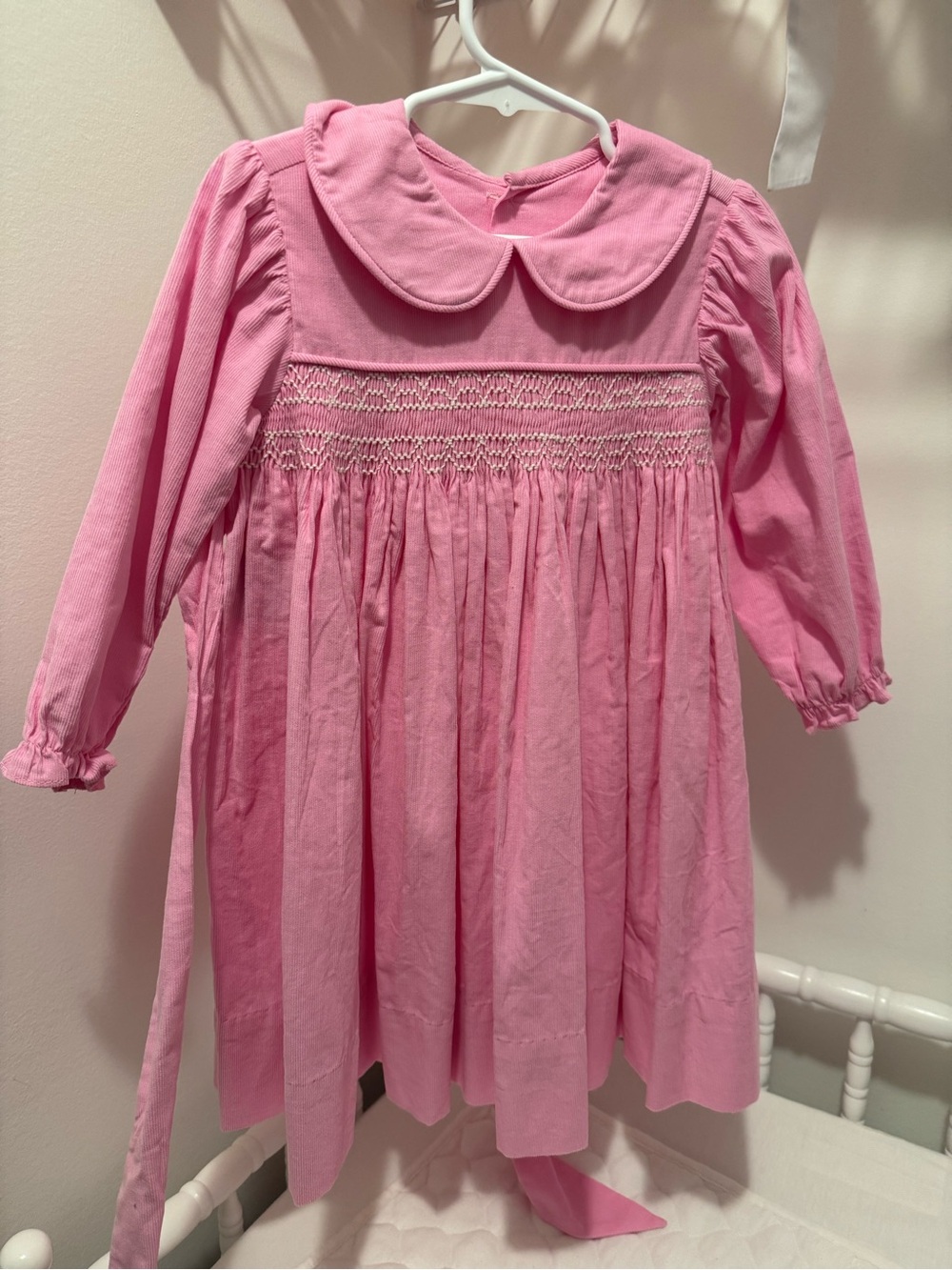 Smocked Pink Long-Sleeve Girls' Dress with Peter Pan Collar